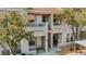 Charming multi-story condo boasts a private balcony and well-maintained front entrance in a desirable neighborhood at 10001 Peace Way # 2269, Las Vegas, NV 89147