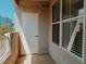 Outdoor patio with railings and a door to a storage closet in view at 10001 Peace Way # 2269, Las Vegas, NV 89147