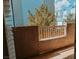 View of an outdoor patio with a view of trees and multi-story buildings at 10001 Peace Way # 2269, Las Vegas, NV 89147