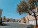 Exterior street view showcases the community's architecture and residential layout at 10001 Peace Way # 2269, Las Vegas, NV 89147