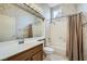 Full bathroom featuring a shower-tub combination, and large countertop with generous mirror at 10800 Brinkwood Ave, Las Vegas, NV 89134