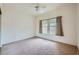 Bedroom with closet and window offers a cozy space with carpet that can be used for rest, study or relaxation at 10800 Brinkwood Ave, Las Vegas, NV 89134