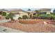 Well-maintained house with low-maintenance landscaping and decorative brickwork at 10800 Brinkwood Ave, Las Vegas, NV 89134