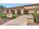 Community fitness center with manicured landscaping at entrance at 10800 Brinkwood Ave, Las Vegas, NV 89134