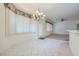 Bright kitchen nook with tile floors, natural light, and access to the backyard is perfect for casual meals at 10800 Brinkwood Ave, Las Vegas, NV 89134