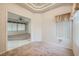 Spacious living room with carpet and ample natural light offers a cozy space for relaxation and entertainment at 10800 Brinkwood Ave, Las Vegas, NV 89134