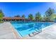 Beautiful community swimming pool for relaxing and enjoying the summer weather at 10800 Brinkwood Ave, Las Vegas, NV 89134