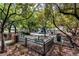 Shady community park and playground featuring mature trees, picnic tables, and play structures at 1136 Jamesbury Rd, Las Vegas, NV 89135