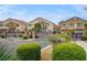 View of community entrance with well-maintained landscaping and secure gate at 1162 Red Margin Ct # 101, Las Vegas, NV 89183