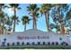 Silverado Ranch entrance with lush landscaping and updated signage at 1162 Red Margin Ct # 101, Las Vegas, NV 89183