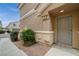 Close-up of unit #101 front door with landscaping at 1162 Red Margin Ct # 101, Las Vegas, NV 89183