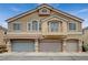 Charming townhome featuring a private balcony and attached garages at 1162 Red Margin Ct # 101, Las Vegas, NV 89183