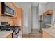 Modern kitchen with stainless steel appliances, gas range, and ample cabinet space at 1162 Red Margin Ct # 101, Las Vegas, NV 89183