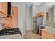 Functional kitchen with stainless steel appliances and natural wood cabinetry at 1162 Red Margin Ct # 101, Las Vegas, NV 89183