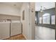 Laundry room featuring a washer, dryer, with a view to the great room at 1162 Red Margin Ct # 101, Las Vegas, NV 89183