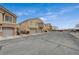 Street view of townhomes with garage entrances at 1162 Red Margin Ct # 101, Las Vegas, NV 89183