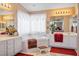 Bright bathroom with dual vanities, a large soaking tub, and stylish decor at 1163 Regal Lily Way, Las Vegas, NV 89123