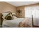Comfortable bedroom with warm lighting, neutral colors and soft textures at 1163 Regal Lily Way, Las Vegas, NV 89123