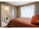 Bedroom with neutral color scheme, and adjacent bathroom at 1163 Regal Lily Way, Las Vegas, NV 89123