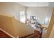Staircase view of the living room with high ceilings and lots of natural light at 1163 Regal Lily Way, Las Vegas, NV 89123