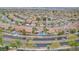 An aerial view showcases the neighborhood with mature trees and well-maintained streets at 1304 Autumn Wind Way, Henderson, NV 89052