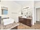Bathroom with double vanity, granite countertops and updated sinks at 1304 Autumn Wind Way, Henderson, NV 89052