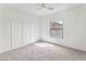 Bright bedroom featuring natural light from the window and a ceiling fan at 1304 Autumn Wind Way, Henderson, NV 89052