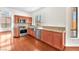 Well-lit kitchen with stainless steel appliances, window views, and granite countertops at 1304 Autumn Wind Way, Henderson, NV 89052