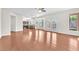 Open living room showcases hardwood floors, bright light, and kitchen access at 1304 Autumn Wind Way, Henderson, NV 89052