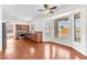 Open floor plan connecting the living area with the kitchen and backyard views at 1304 Autumn Wind Way, Henderson, NV 89052