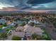 A gorgeous property from above with beautiful trees, a pool, and a putting green for outdoor enjoyment at 1377 Ruby Sky Ct, Henderson, NV 89052