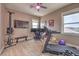 This home features a workout room with a treadmill, multiple monitors and a gaming chair at 1377 Ruby Sky Ct, Henderson, NV 89052