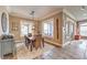 Cozy dining room with natural light, decorative rug, and view of the backyard at 1377 Ruby Sky Ct, Henderson, NV 89052