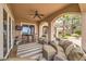 Covered outdoor living space perfect for relaxing and enjoying the backyard view at 1377 Ruby Sky Ct, Henderson, NV 89052