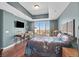 Bedroom with hardwood floors, desk, chair, and city views, with natural light at 150 Las Vegas Blvd # 1004, Las Vegas, NV 89101