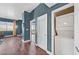 Living area with hardwood floors, city views and in-unit laundry machines at 150 Las Vegas Blvd # 1004, Las Vegas, NV 89101
