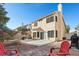 Spacious backyard with mature landscaping and a built in BBQ area and patio furniture at 1705 Desert Ridge Ave, North Las Vegas, NV 89031