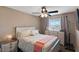 This bedroom features a view of the outside with a TV and queen bed at 1708 Crest Ave, Las Vegas, NV 89119