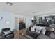 Open living room features modern furnishings and decor, tiled floors, and seamless living at 1708 Crest Ave, Las Vegas, NV 89119