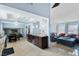 Open concept living area with kitchen, dining, and living room all connected at 1708 Crest Ave, Las Vegas, NV 89119