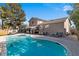 The crystal-clear pool provides a refreshing escape, complemented by a spacious patio perfect for outdoor lounging and dining at 1708 Crest Ave, Las Vegas, NV 89119