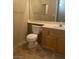 Practical bathroom featuring a toilet, vanity, and mirror at 1830 Buffalo Dr # 2083, Las Vegas, NV 89128