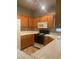 Bright kitchen featuring wooden cabinets and standard appliances at 1830 Buffalo Dr # 2083, Las Vegas, NV 89128