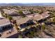 Aerial view of desert landscaped home featuring a back patio and manicured neighborhood at 1908 Oliver Springs St, Henderson, NV 89052