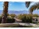Mountain view image featuring blue skies, trees and professional landscaping at 1908 Oliver Springs St, Henderson, NV 89052