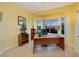 Office with built-in shelving, a work desk and a large window offering a neighborhood view at 1908 Oliver Springs St, Henderson, NV 89052