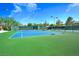 Well-maintained tennis court with excellent playing surface and surrounding fencing at 1908 Oliver Springs St, Henderson, NV 89052