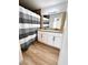 Bathroom boasts double sinks and wood-style flooring at 2200 S Fort Apache Rd # 2123, Las Vegas, NV 89117