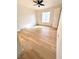 This bedroom features wood-style flooring and a ceiling fan at 2200 S Fort Apache Rd # 2123, Las Vegas, NV 89117