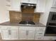 Updated kitchen with stainless steel appliances, including a gas cooktop at 2200 S Fort Apache Rd # 2123, Las Vegas, NV 89117